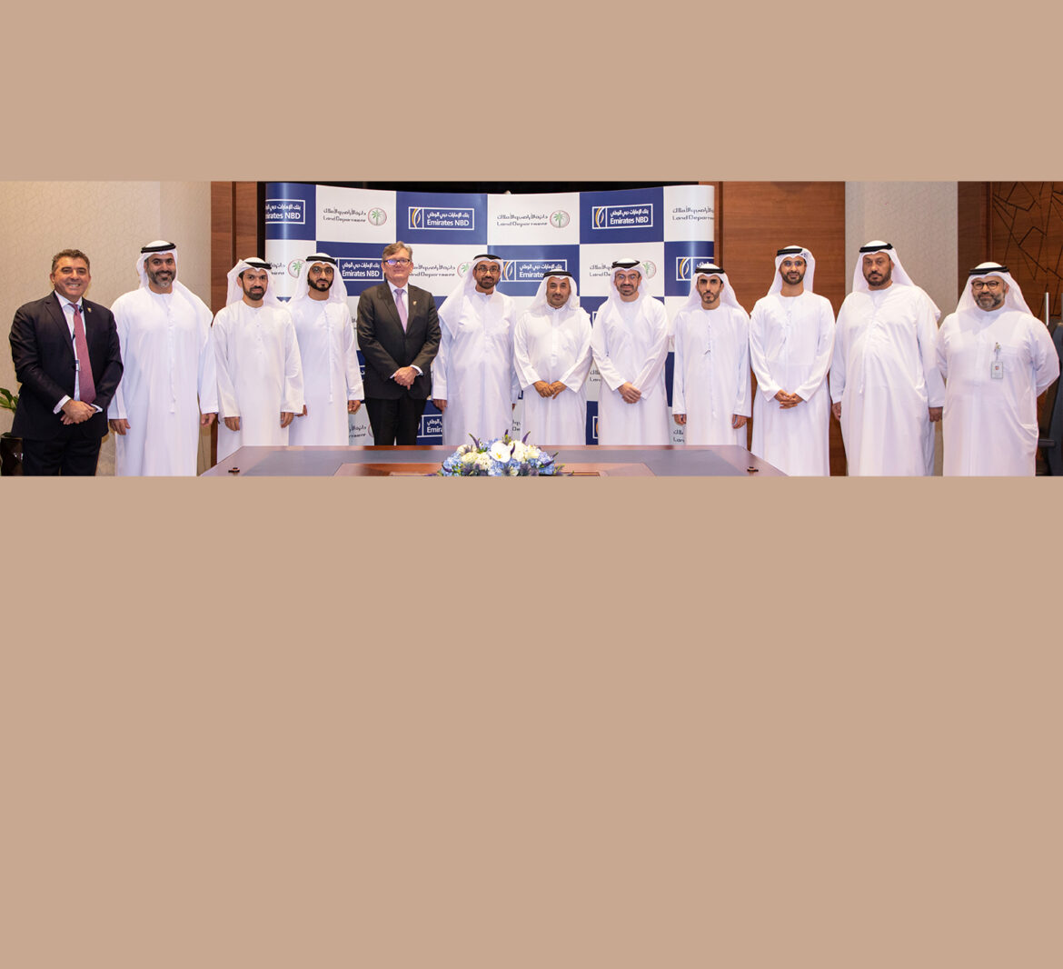 تعاون استراتيجي بين دائرة الأراضي والأملاك في دبي وبنك الإمارات دبي الوطني لتعزيز قطاع العقارات في الدولة